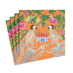 The Caspari Monkeys Orange napkins feature two monkeys by a bowl of fruit, surrounded by flowers and green foliage. Set includes four triple-ply orange napkins.