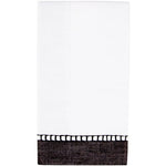 Caspari Linen Border in Black: a neatly folded white hand towel with a black border—an elegant upgrade from traditional biodegradable napkins.