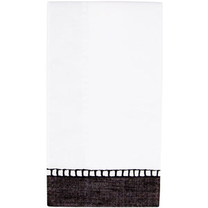 Caspari Linen Border in Black: a neatly folded white hand towel with a black border—an elegant upgrade from traditional biodegradable napkins.