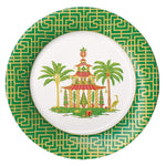 The Caspari Christmas Pagodas Collection dinner plate features a green and gold geometric border with a central pagoda, two palm trees, and a bird on a white background.