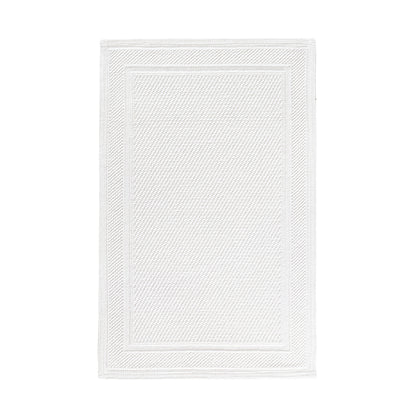 The Bee Waffle Bath Collection by GRACCIOZA features a rectangular white combed cotton bath mat with a subtle border and gentle textured finish, shown on a plain white background.