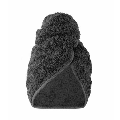 The Egoist Spa Accessories hair towel by Graciozza, crafted from plush Egyptian Cotton Giza in dark gray, is folded and twisted into a turban shape and displayed against a plain white background.
