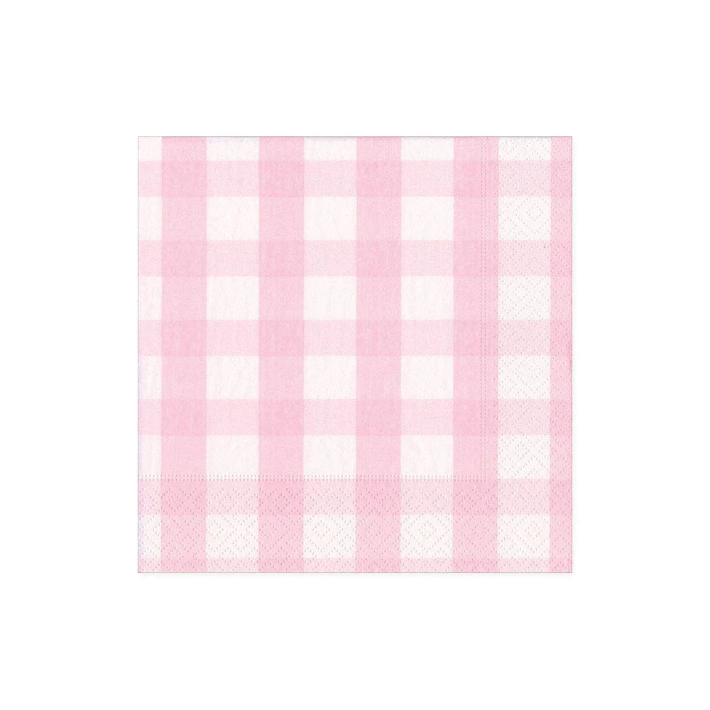 The Caspari Gingham Cocktail Napkin Collection features pink and white gingham napkins with a subtle textured border—ideal for adding charm to any table setting.