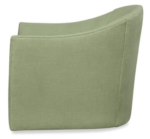 A side view of the Highland House Wear Low Profile Swivel Chair in spring green upholstery, showcasing its curved back and clean, simple lines.