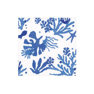 The Caspari Matisse Collection features white, triple-ply tissue napkins with blue coral and seaweed patterns—an elegant, eco-friendly choice for any coastal-inspired table setting.