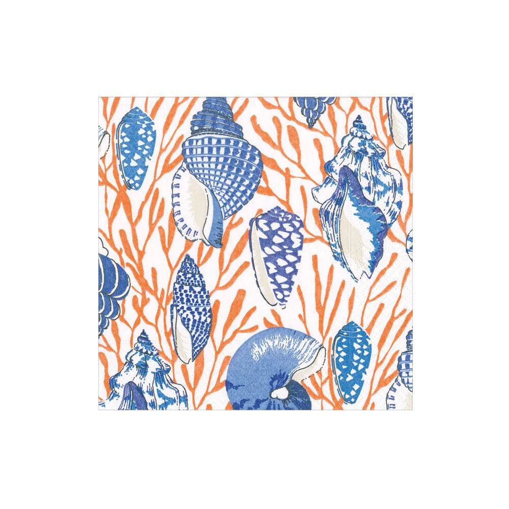 The Shell Toile Collection by Caspari features blue and white seashell patterns over orange coral branches on a white background—ideal for elegant table settings, entertaining, or gifting.