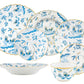 The Ginori 1735 Oro Di Doccia Turchese Dinnerware Collection is a set of seven porcelain pieces—plates, a bowl, and a cup—featuring blue floral and bird motifs with hand-painted gold trim and elegant Ji Ondori roosters.