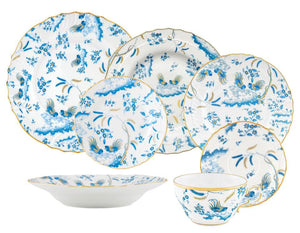 The Ginori 1735 Oro Di Doccia Turchese Dinnerware Collection is a set of seven porcelain pieces—plates, a bowl, and a cup—featuring blue floral and bird motifs with hand-painted gold trim and elegant Ji Ondori roosters.