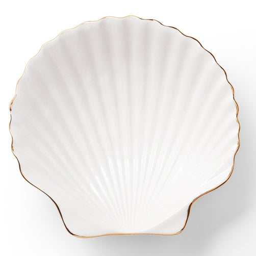 The Shell Appetizer Plate by Aerin is a white ceramic scallop shell dish with elegant gold edging, shown on a white background—an ideal choice for bringing coastal style to your table.