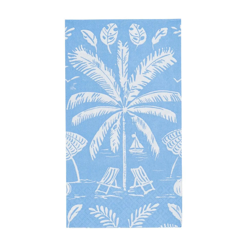 Caspari’s Palms and Parasols Ocean blue beach towel, featuring white palm trees, sailboats, and lounge chairs, pairs perfectly with eco-friendly or biodegradable napkins for a sustainable beach day.