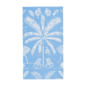 Caspari’s Palms and Parasols Ocean blue beach towel, featuring white palm trees, sailboats, and lounge chairs, pairs perfectly with eco-friendly or biodegradable napkins for a sustainable beach day.
