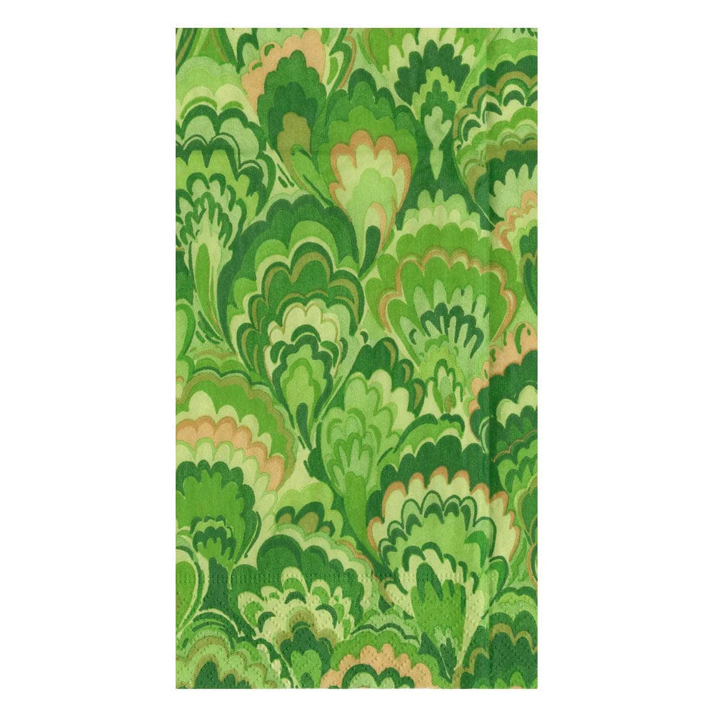 Caspari’s Marbled Ceramica Collection features a patterned fabric with overlapping abstract leaf shapes in green tones and tan accents, evoking the look of marbled waves.