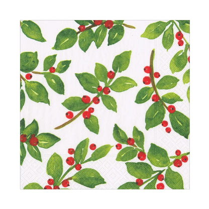 The Painted Holly White Collection napkin by Caspari features a white background with scattered green leaves and red berries, evoking festive holly—ideal for holiday table settings or stylish party supplies.
