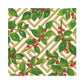 The Holly and Fretwork White Collection by Caspari features green leaves and red berries over a gold and white geometric lattice, making these paper plates ideal for festive gatherings or elegant disposable tableware.