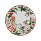 The Caspari Christmas Chinoiserie White Collection round ceramic plate features a colorful floral and berry rim—ideal for adding elegance to your party table or pairing with other disposable tableware.
