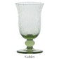 A green goblet from Juliska’s Provence Basil Drinkware Collection, featuring a textured design with a round base and flared rim, is displayed against a white background. “Goblet” appears below this Provence-inspired glassware.