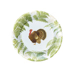 The Caspari Turkey Among Ferns Partyware Collection features a decorative plate with green fern patterns and a central turkey illustration, ideal for festive Thanksgiving table settings.