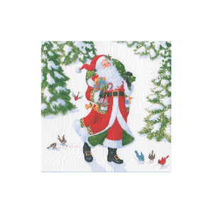 Featuring Caspari's Woodland Santa Collection, this design shows Santa walking in a snowy forest with a gift sack, birds, and evergreens—perfect for festive decorative paper plates or holiday-themed dinnerware.