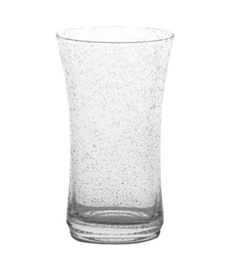 A clear, empty tumbler from the Juliska Provence Basil Drinkware Collection, featuring a slightly flared rim and textured surface, is shown against a white background.