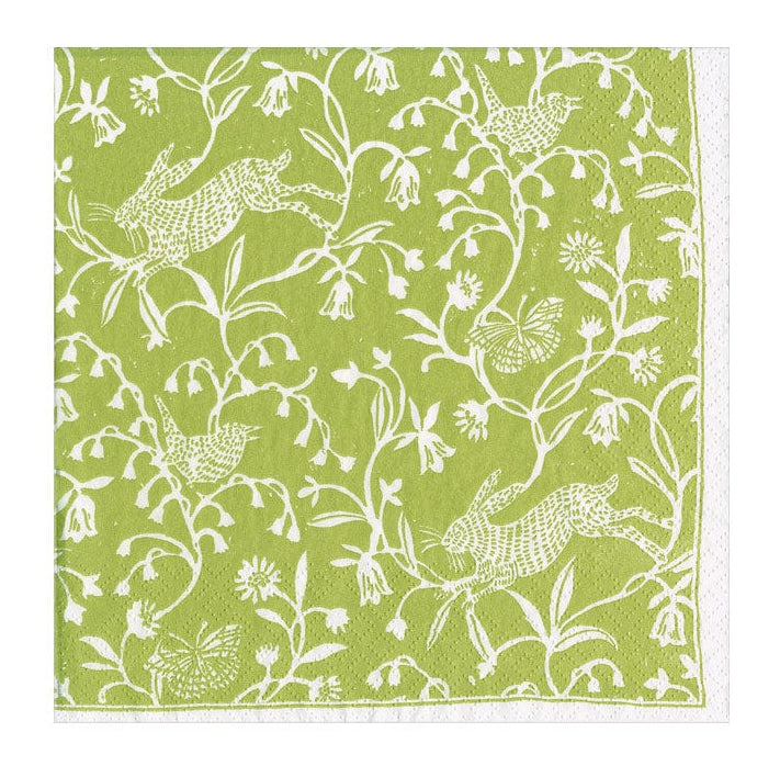 The Caspari Hedgerow Napkin Collection features a green, triple-ply square napkin with a white rabbits and plants pattern.