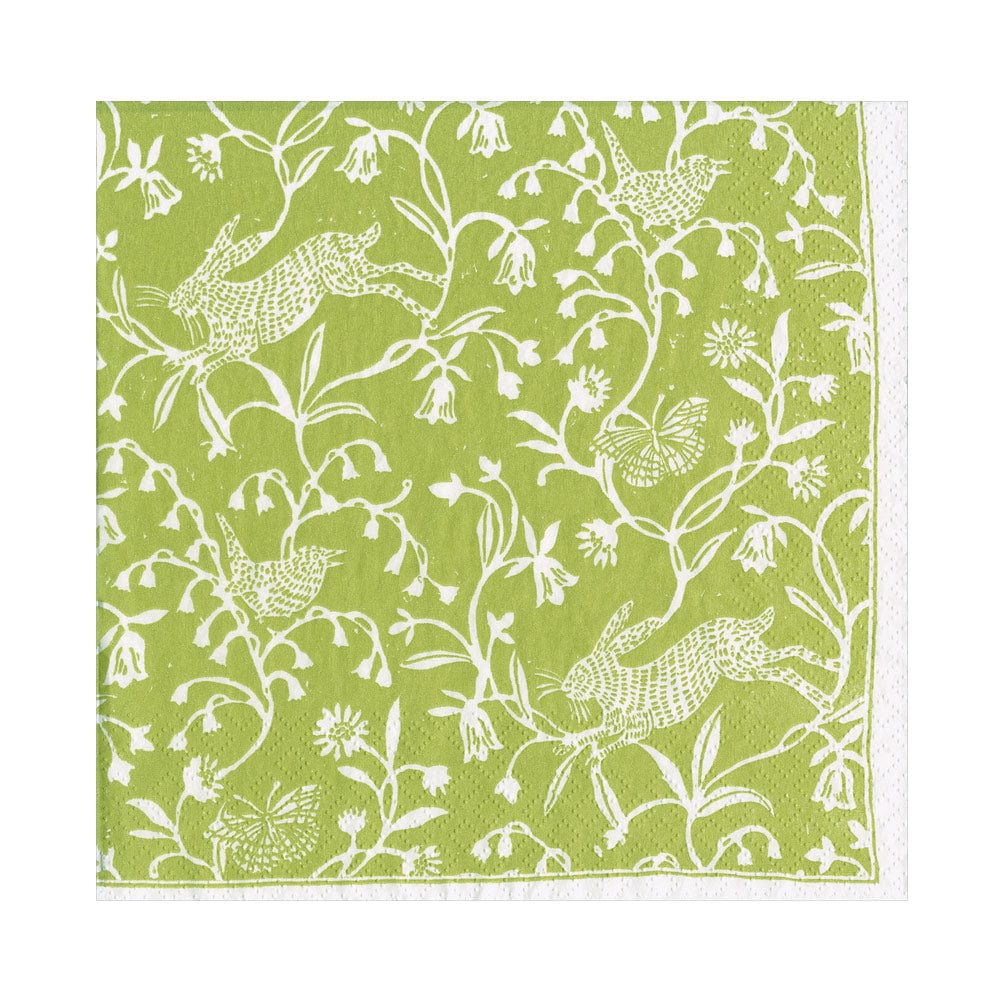 The Hedgerow Napkin Collection by Caspari features green triple-ply napkins with a white illustrated pattern of leaping rabbits, birds, butterflies, and flowers.