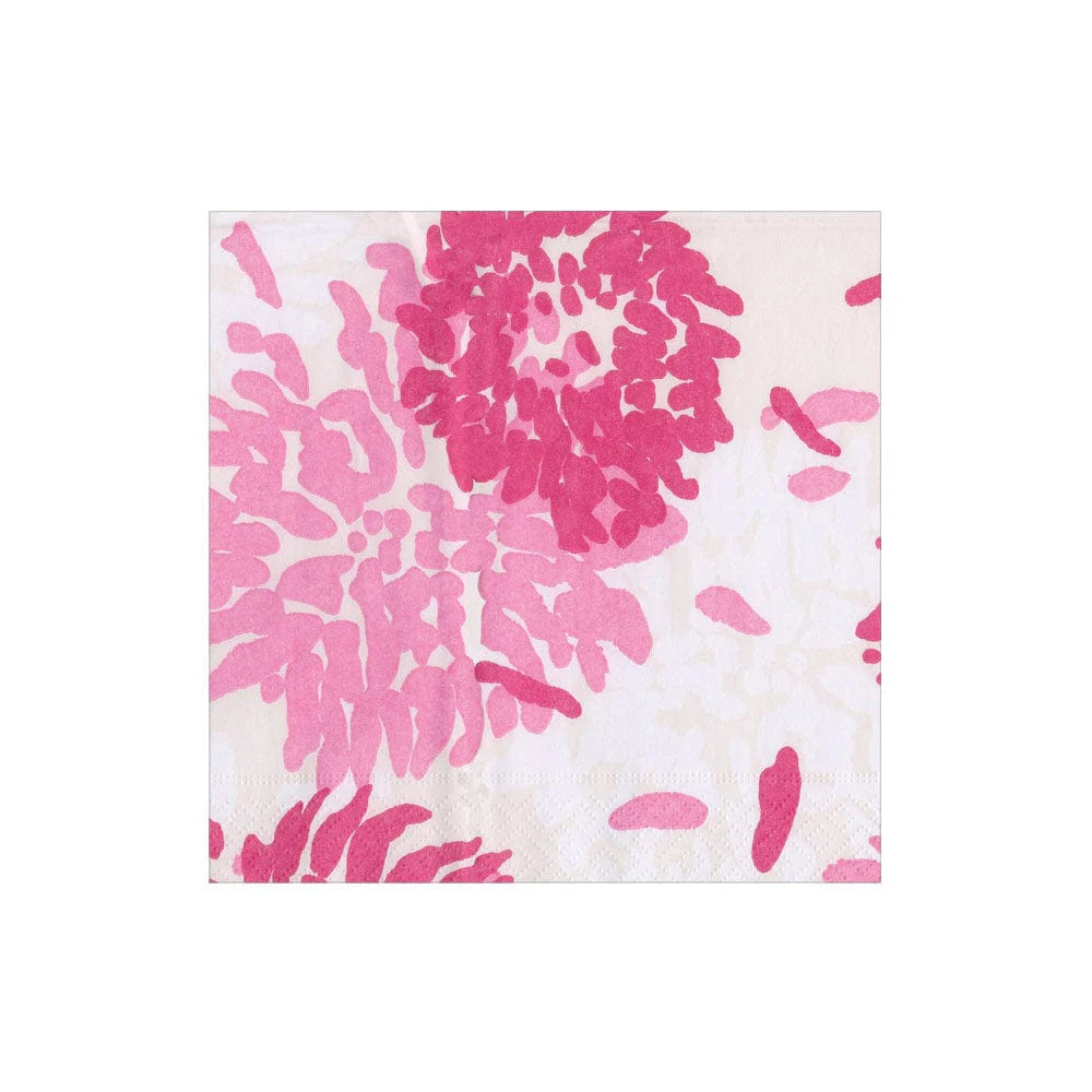 Caspari’s Chrysanthemum Raspberry Collection napkins feature a white background with large pink floral designs; these triple-ply, eco-friendly napkins offer both style and sustainability.
