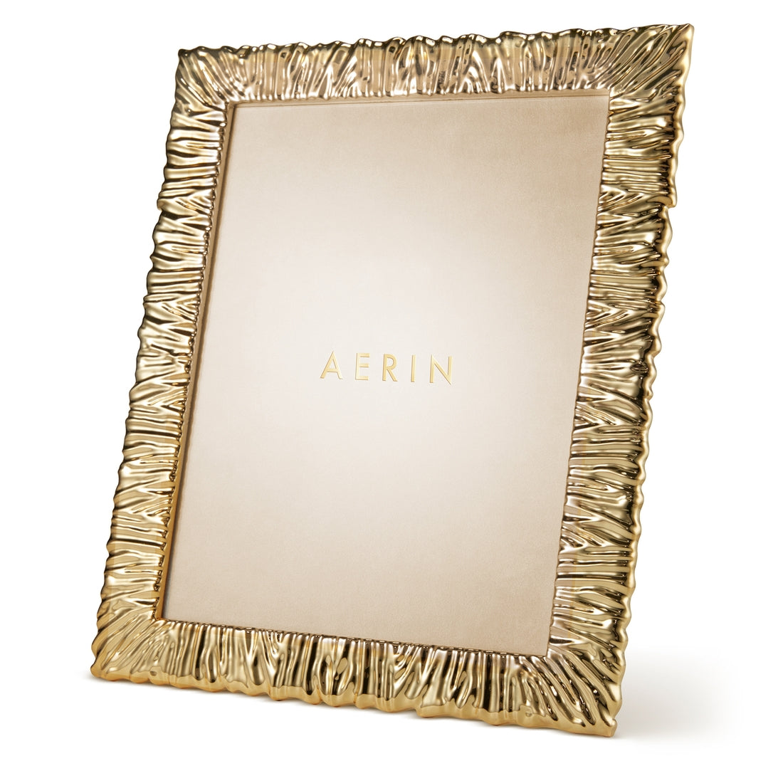 From the Ambroise Frame Collection by Aerin, this brass-plated frame features a textured, wavy border and stands upright, with a beige placeholder displaying "AERIN" at the center.