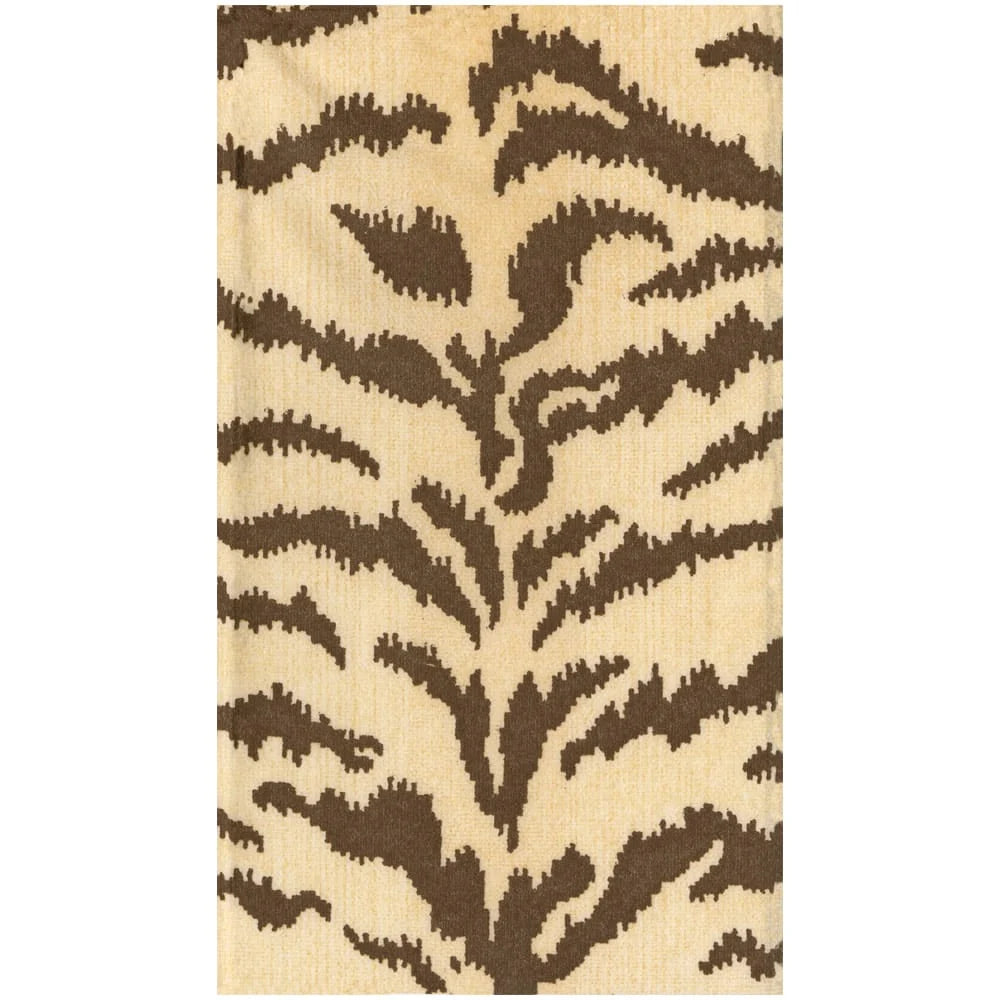 The Tigre Collection by Caspari features a beige rectangular rug with a brown, nature-inspired pixelated pattern reminiscent of leaves or branches.