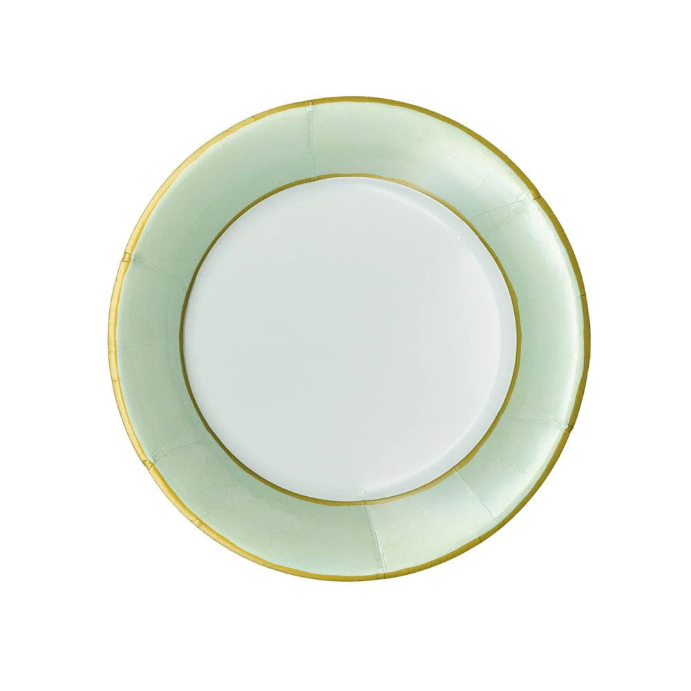 The Caspari Watercolor Paper Plate Collection features round ceramic plates with a pale green border and thin gold rim, evoking elegant disposable dinnerware, set against a white background.