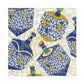 The Patterned Dreidel Collection by Caspari features blue and gold dreidels adorned with Hebrew letters and star motifs, beautifully arranged on a white background with swirling gold patterns—creating a charming Hanukkah scene that’s perfect for holiday gifts or any festive celebration.