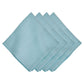 Set of four light blue Berry Scallop Napkins from Juliska, featuring a decorative stitched scalloped edge and neatly stacked on a white background.
