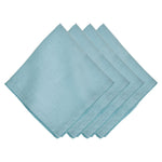 Set of four light blue Berry Scallop Napkins from Juliska, featuring a decorative stitched scalloped edge and neatly stacked on a white background.