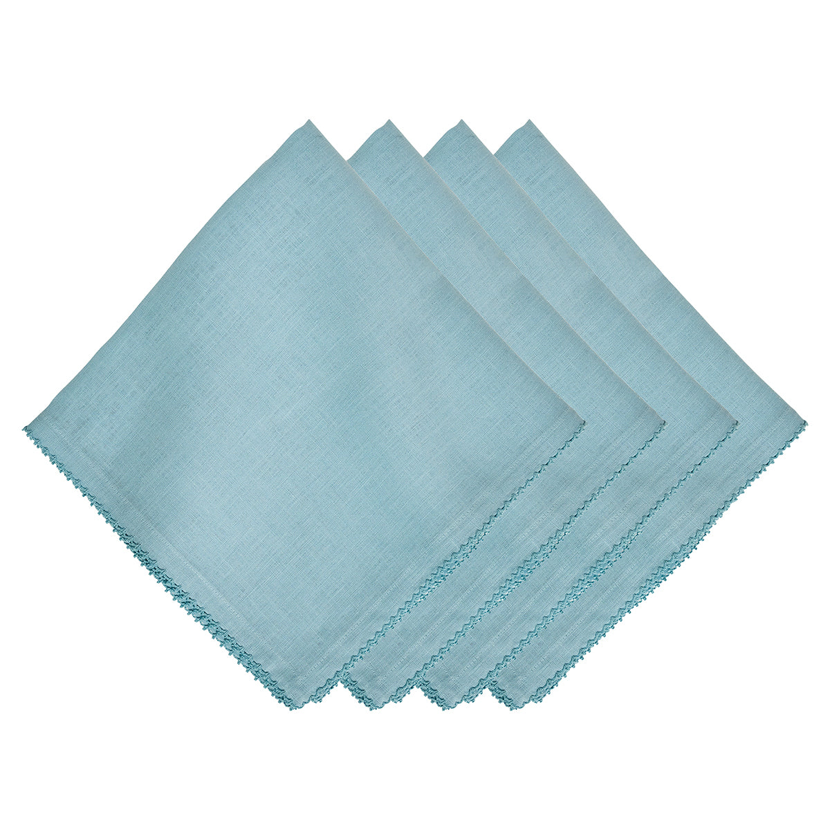 Set of four light blue Berry Scallop Napkins from Juliska, featuring a decorative stitched scalloped edge and neatly stacked on a white background.