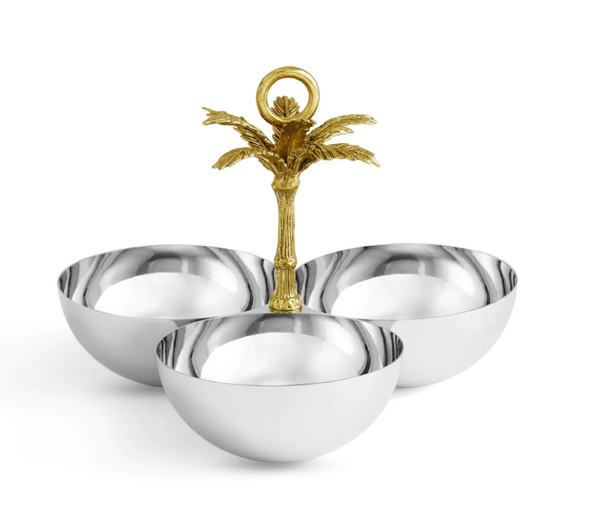 Three-part metallic serving dish from the Michael Aram Palm Collection with a gold-colored palm tree handle featuring sculpted textures and an antique gold finish.
