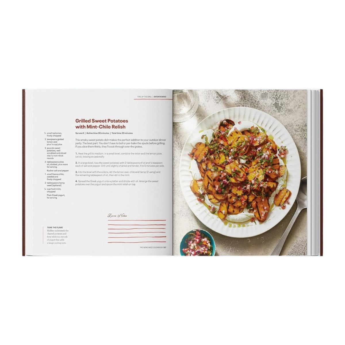 An open copy of The Newlywed Cookbook by Penguin Random House displays a recipe for grilled sweet potatoes with mint-chile relish on the left page and a plated dish of the finished meal on the right page, offering easy recipes perfect for sharing.