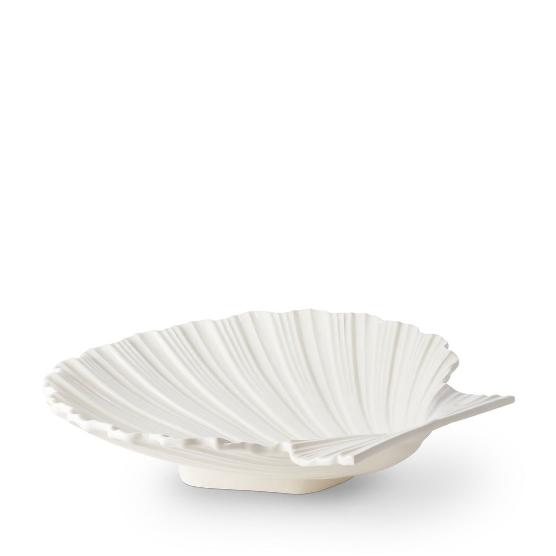 The Cream Shell Platter Collection by Aerin features a white earthenware dish in a scallop shell shape, ideal as a serving platter with timeless coastal style, shown on a plain white background.