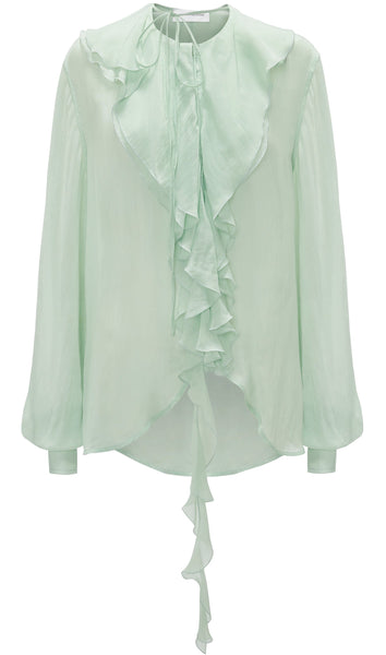 Light green Victoria Beckham Romantic Blouse with ruffled front and long sleeves on a white background.