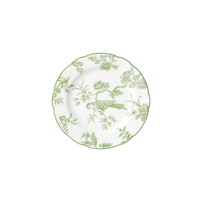 Viewed from above on a plain white background, the Albertine Collection plate by Bernardaud features scalloped edges and a green floral and bird motif—ideal for adding poetic elegance to your table setting.