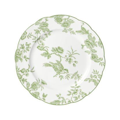 The Albertine Collection by Bernardaud features a white plate with scalloped edges and a green floral bird motif inspired by toile de Jouy, adding poetic elegance to your table setting.