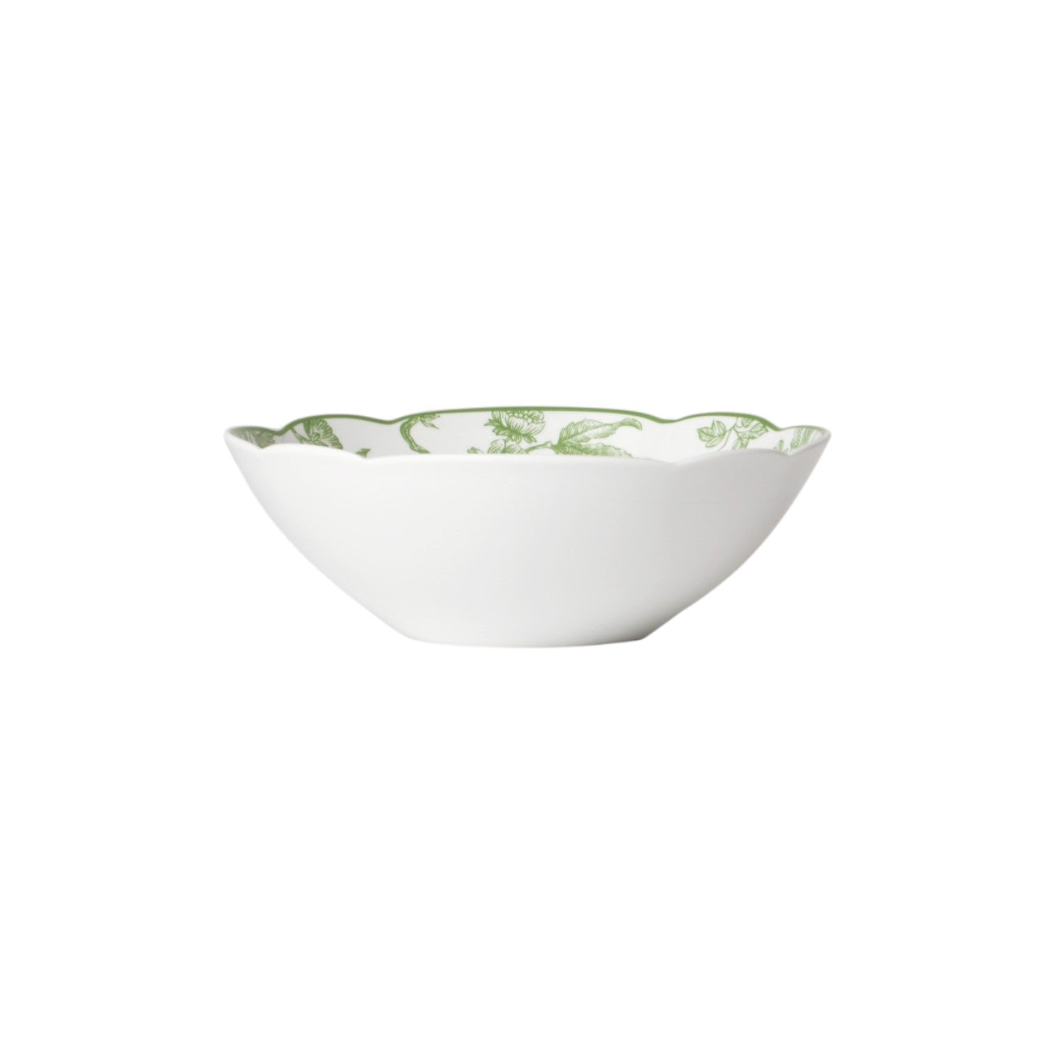 The Bernardaud Albertine Collection features a white porcelain bowl with scalloped edges and a green floral toile de Jouy pattern, displayed against a plain white background.