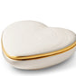 The Cream Calinda Heart Box by Aerin is a white, heart-shaped ceramic box with gold detailing on the lid, shown against a plain white background.