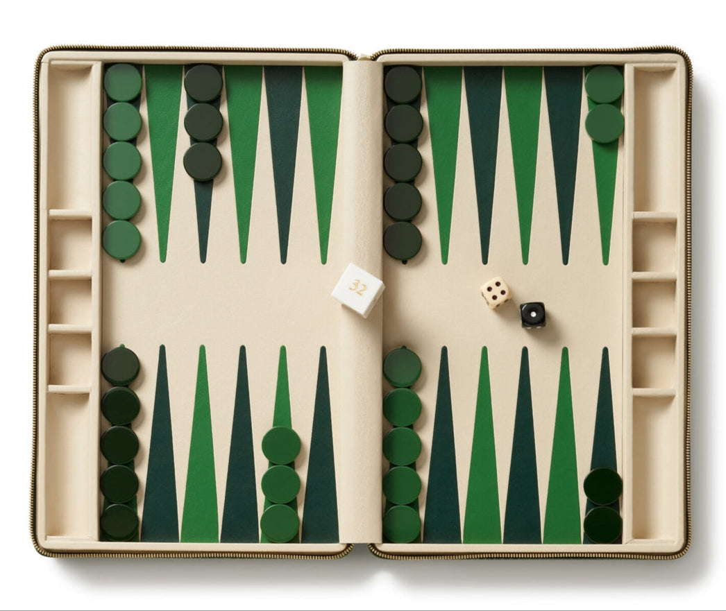 The Enzo Backgammon Travel Set, Verde by Aerin features Italian croc-embossed leather, green and dark green checkers set for play, two dice showing 3 and 2, a doubling cube, all on a compact cream and green surface.