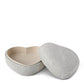 The Aerin Shagreen Heart Box Collection features a heart-shaped box with a matching lid, showcasing an empty beige interior—a charming keepsake for your cherished treasures.