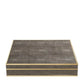 The Aerin Shagreen Chess Set Collection features a rectangular, flat-lidded box with a textured dark grey shagreen surface and light edges, shown against a white background.