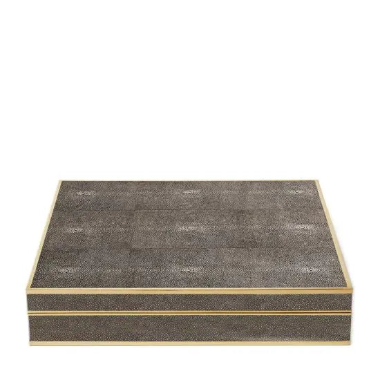 The Aerin Shagreen Chess Set Collection features a rectangular, flat-lidded box with a textured dark grey shagreen surface and light edges, shown against a white background.
