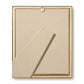 The Alessio Frame Collection by Aerin features a gold-edged rectangular frame with a reeded design, beige back, and angled support stand for elegant photo display on any tabletop.