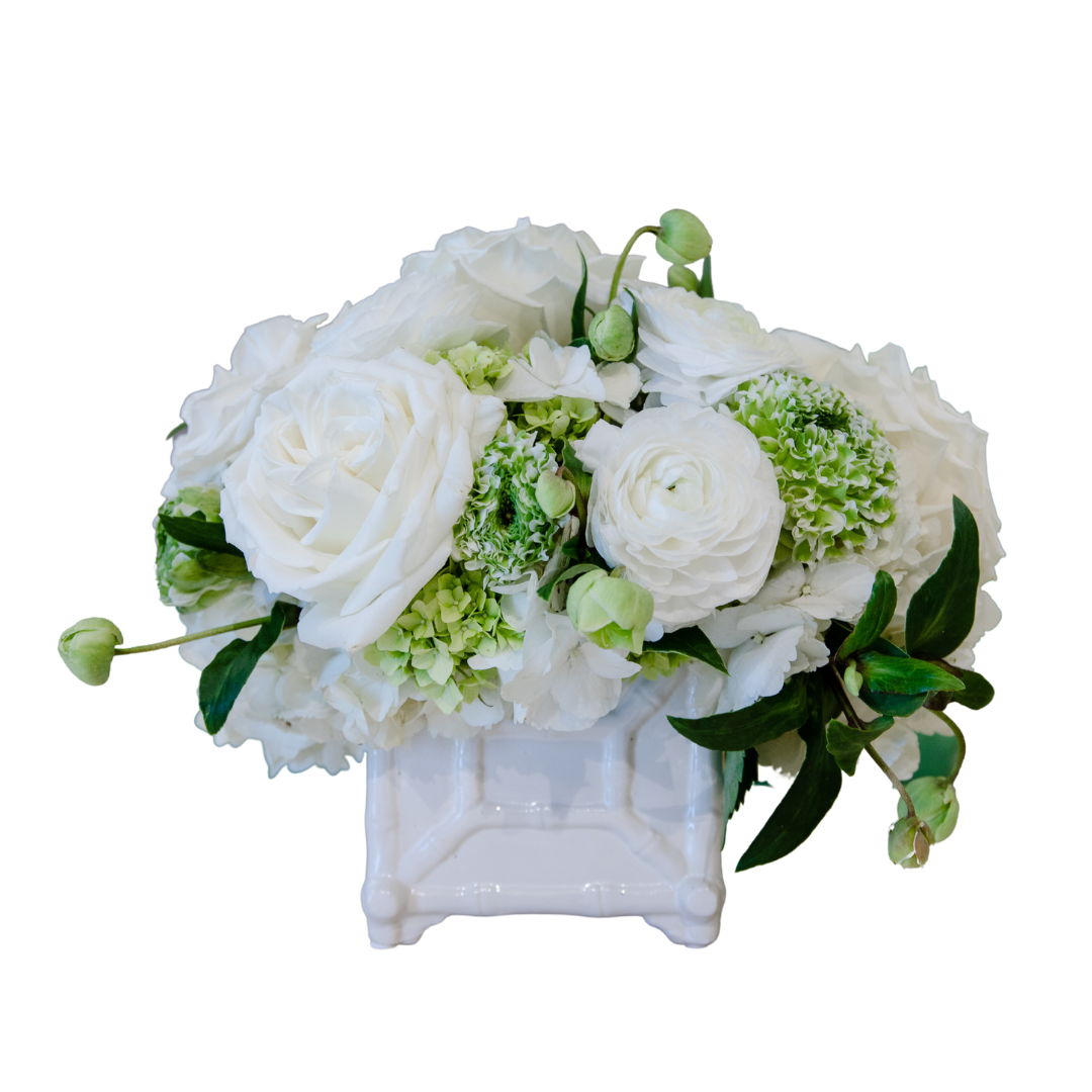 A Live Classic Floral Arrangement in a Chinoiserie Vase on a black background is a versatile choice for interior design. Brand name: Hive Floral Studio.