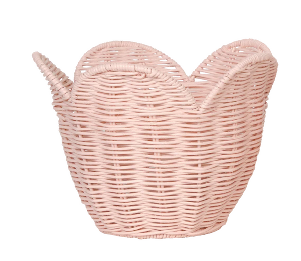Pink wicker basket on a white background for nurseries by Olli Ella.