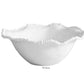 A medium Alegria Bowl from the Vida Alegria Melamine Bowl Collection by Beatriz Ball, featuring a white ceramic look with a wavy, ruffled rim and textured edge—an elegant piece set against a plain white background.