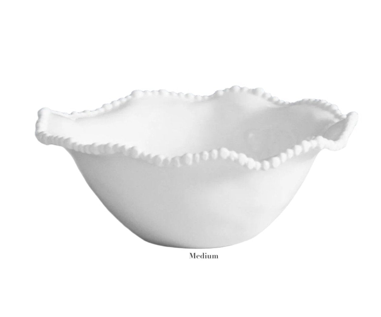 A medium Alegria Bowl from the Vida Alegria Melamine Bowl Collection by Beatriz Ball, featuring a white ceramic look with a wavy, ruffled rim and textured edge—an elegant piece set against a plain white background.